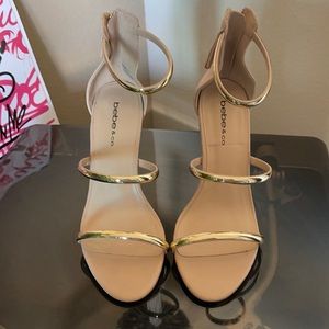 Bebe tan open toe heels sandals with gold straps in great condition! Worn once.